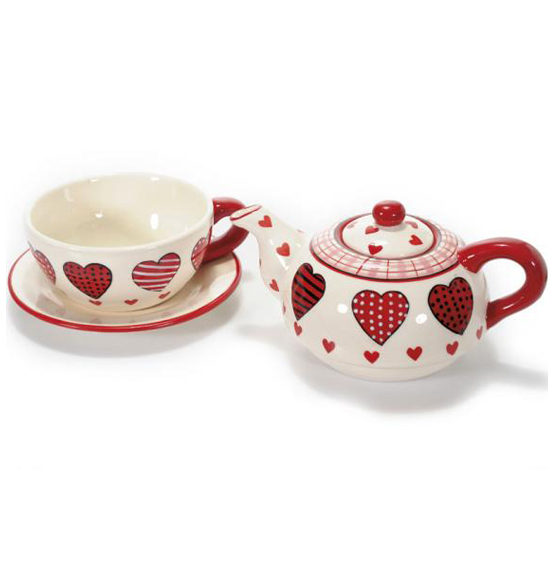 Teiera e tazza in ceramica decorata con cuori